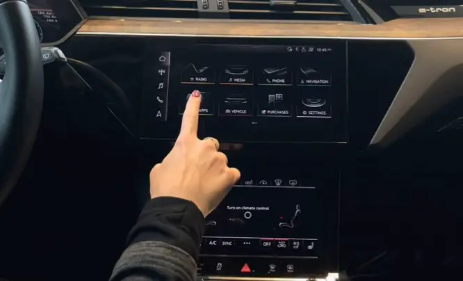 hand finger press on display button setting Audi car