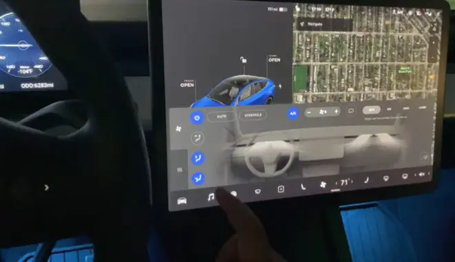 hand press the button on screen display on tesla model y