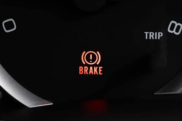 Brake light signal icon on the car panel, Photo close-up.